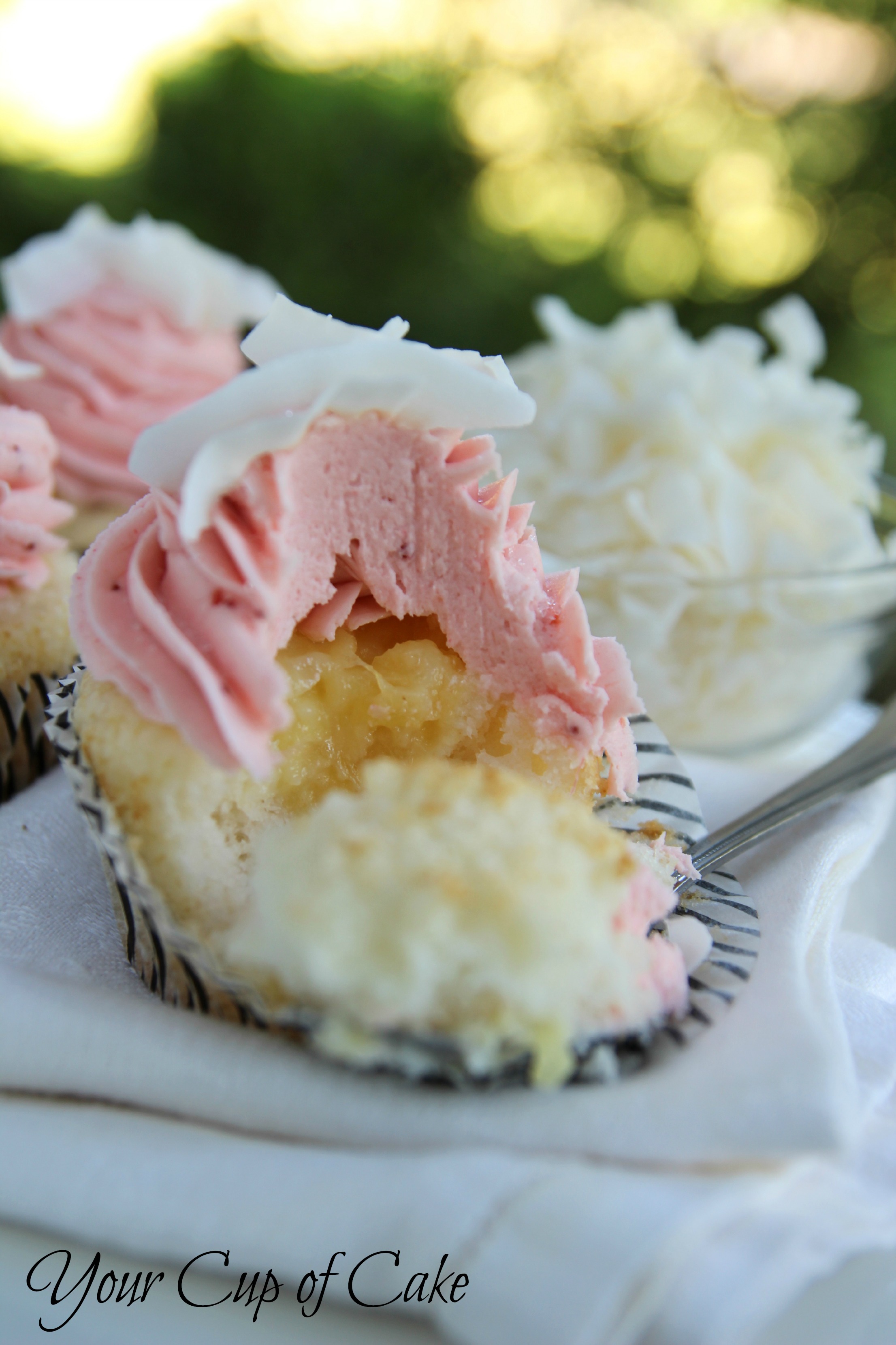 Strawberry Piña Colada Cupcakes - Your Cup of Cake