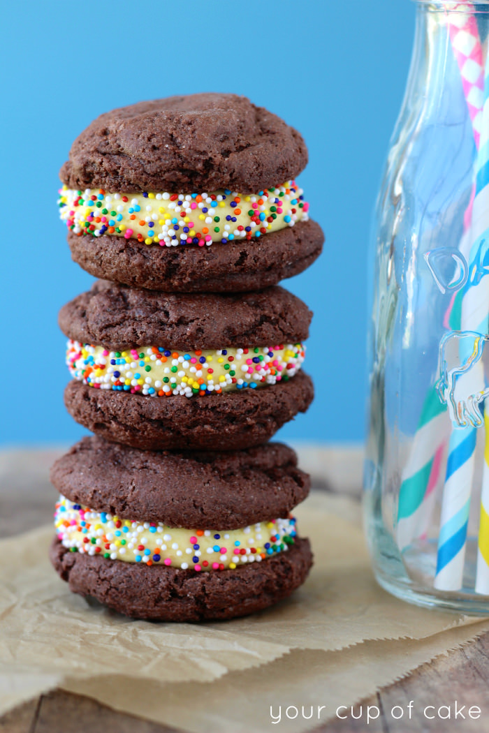 /><br/> <br/> Homemade Birthday Cake Oreos<br/> <br/> Ingredients<br/> Soft Oreo Cookies:<br/> 1 box Devil's Food Cake Mix<br/> 2 eggs<br/> 1/3 C. oil<br/> 2 tsp, vanilla extract<br/> Cake Batter Filling:<br/> 6 Tbsp. butter, room temperature<br/> 4 oz. cream cheese<br/> 1/3 C. yellow cake mix, dry from the box<br/> 2 tsp. vanilla extract<br/> 1 Tbsp. milk<br/> 2 C. powdered sugar (more if needed)<br/> yellow food coloring, optional<br/> Sprinkles for decoration<br/> <br/> Directions<br/> 1. Preheat oven to 350 degrees and line cookie sheets with parchment paper.<br/> <br/> 2. Sift cake mix into a large bowl to remove lumps and add eggs, oil and vanilla extract. Stir until well combined, dough will be thick.<br/> <br/> 3. Make dough balls just smaller than a golf balls and place on cookie sheets 3 inches apart from each other. Bake for 7-9 minutes.<br/> <br/> 4. Let cool.<br/> <br/> 5. Cake Batter Filling: Beat butter and cream cheese until smooth. Add yellow cake mix, vanilla extract and milk and beat again. Slowly add in powdered sugar until you reach your desired consistency. Add in yellow food coloring if desired.<br/> <br/> 6. To assemble: Frost the bottoms of half the cookies and then place an unfrosted cookie on top of each. Roll the exposed edge in a bowl of sprinkles to decorate!<br/> Copyright Â© YourCupofCake</p>