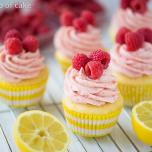 Raspberry Lemonade Cupcakes with a scratch and cake mix recipe! The raspberry frosting is to die for!