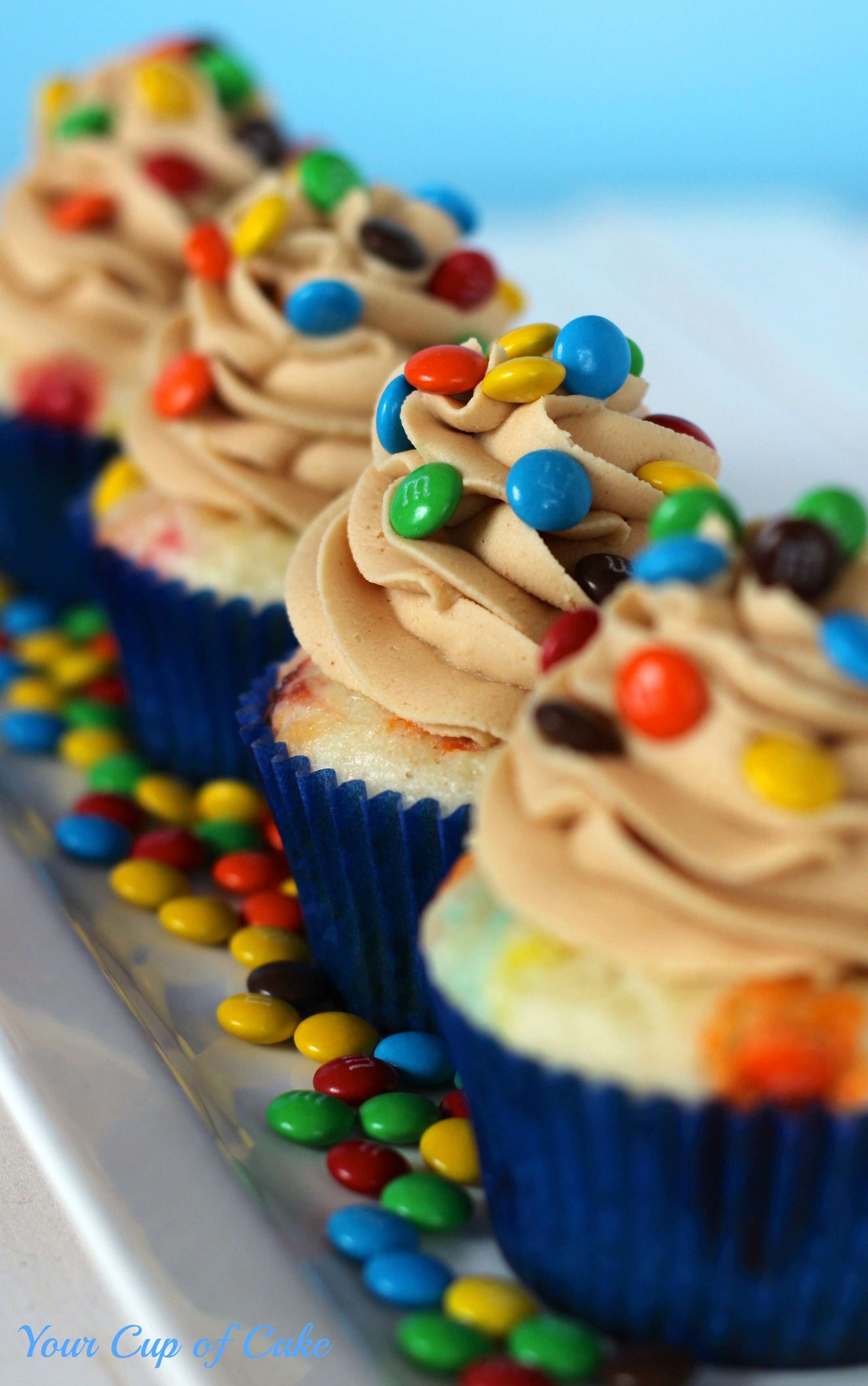 M&amp;M Cupcakes with Peanut Butter Frosting - Your Cup of Cake