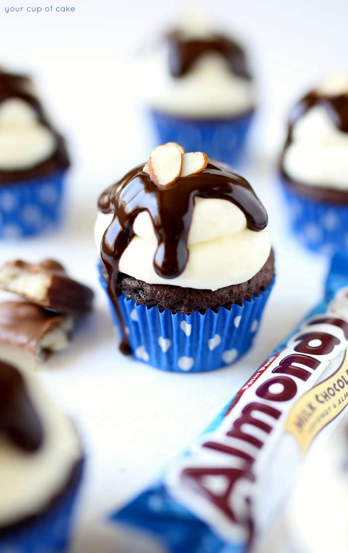 Almond Joy Cupcakes dripping in chocolate