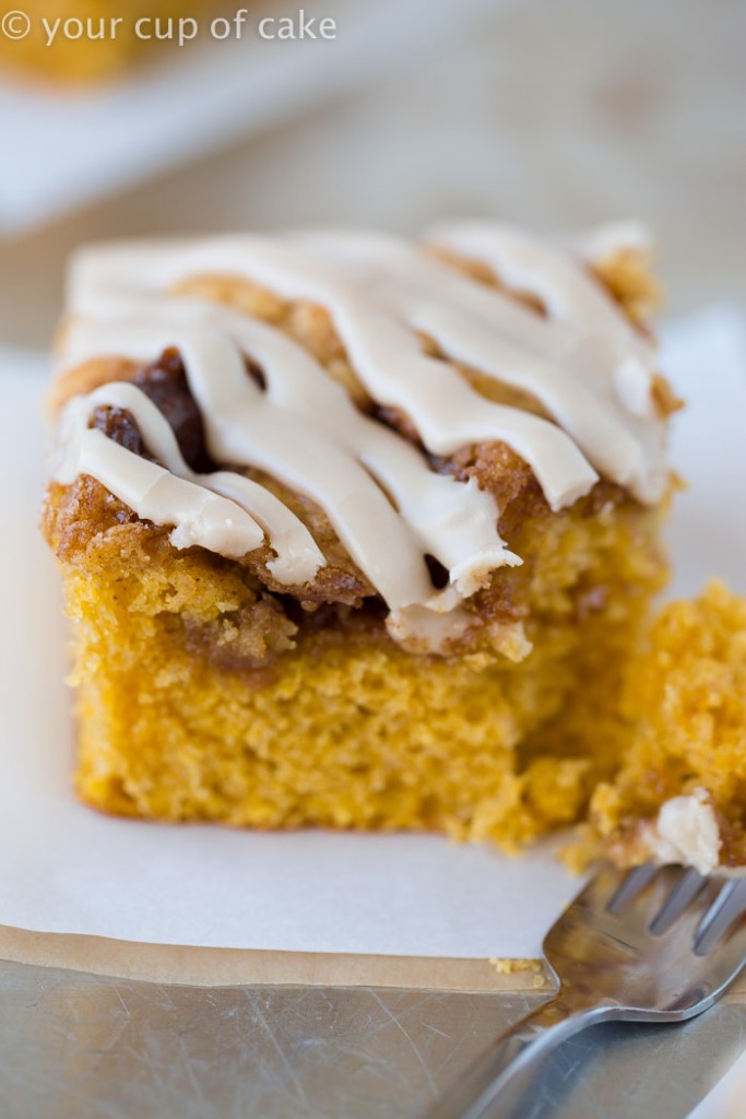 This Pumpkin Cinnamon Roll Cake is the most amazing cake ever! Serve it warm with the maple glaze! 