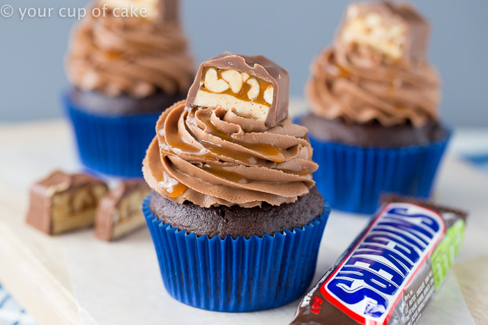 Snickers Cupcakes with chocolate peanut butter frosting!  These are SO good! 