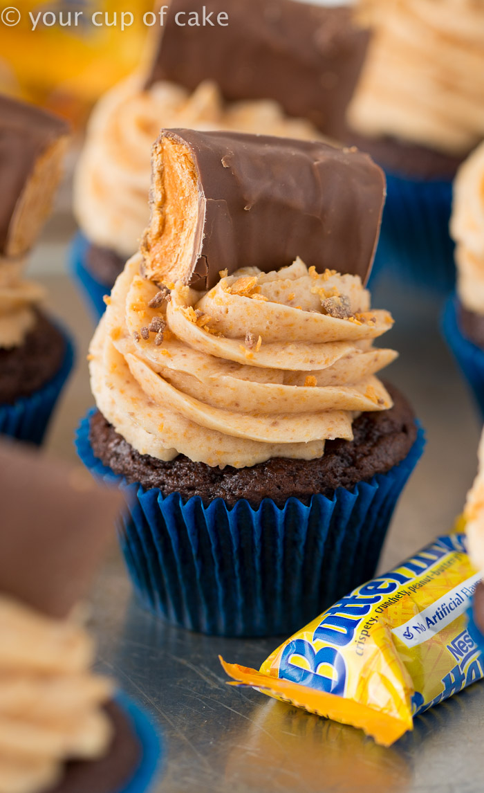 Butterfinger Blizzard Cupcakes!  This recipe is SO GOOD! I just want to eat the frosting on everything!