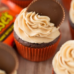 Reese's Peanut Butter Cupcakes with the fluffiest peanut butter frosting! Yum! Love this Recipe!