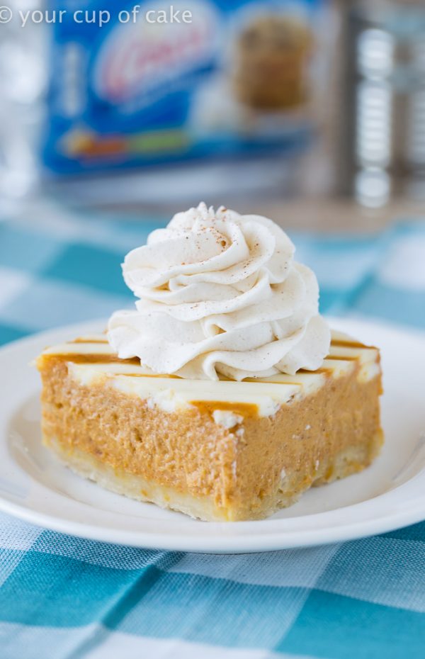 Pumpkin Pie Bars with a Cream Cheese Swirl and a no fuss crust! So easy and perfect for Thanksgiving!