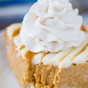 Pumpkin Pie Bars with a Cream Cheese Swirl and a no fuss crust! So easy and perfect for Thanksgiving!