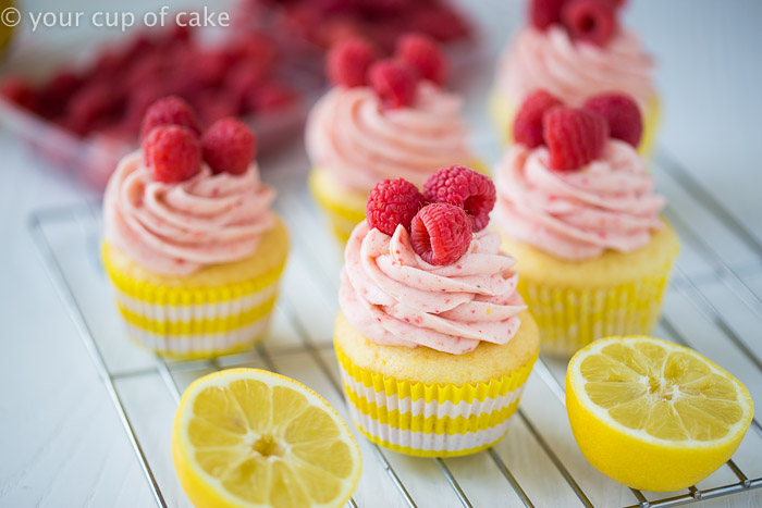 Raspberry Lemonade Cupcakes with a scratch and cake mix recipe! The raspberry frosting is to die for!