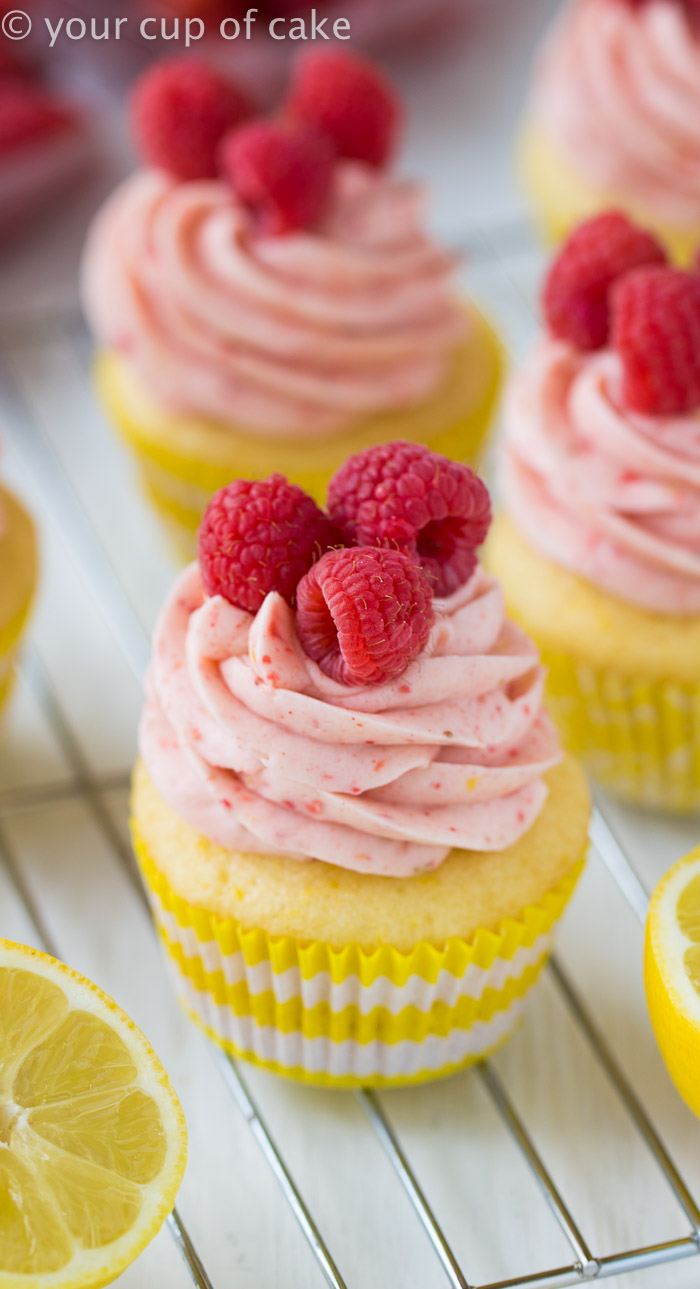 Raspberry Lemonade Cupcakes with a scratch and cake mix recipe! The raspberry frosting is to die for!