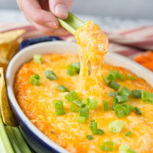 I love serving this Cheesy Buffalo Chicken Dip with celery sticks!