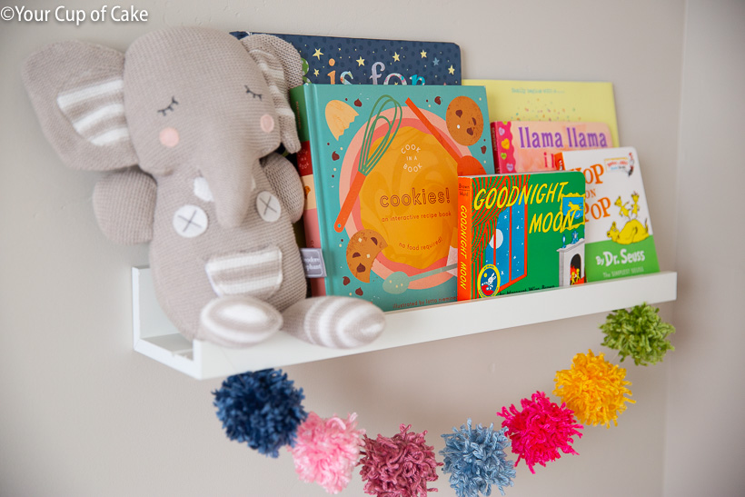 Ikea Picture Ledges used as shelves in a nursery, so cute! 