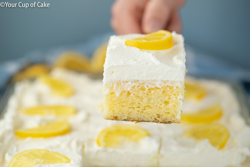 YUM! Easy Lemon Cream Poke Cake made with . cake mix, so easy and so good!