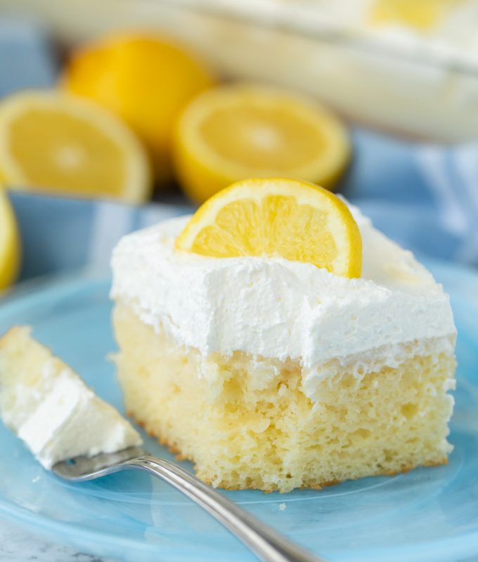 The most AMAZING Easy Lemon Cream Poke Cake ever, I'm obsessed with this recipe