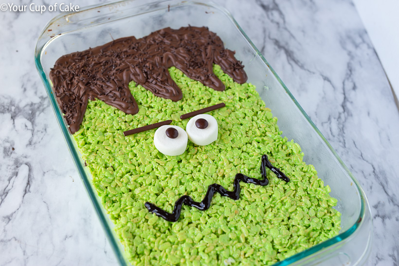 I LOVE this idea of making one HUGE Frankenstein RIce Krispie treat for halloween!