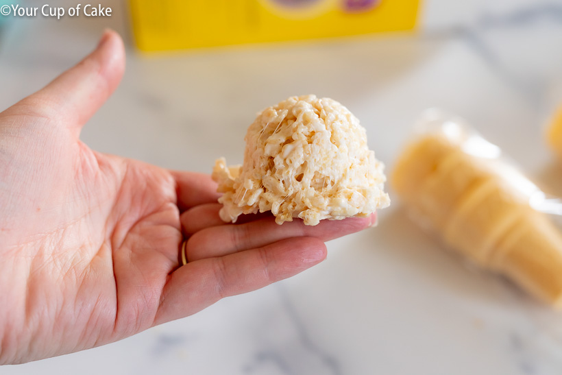 A scoop of ice cream made out of Rice Krispies